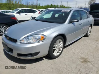 2012 Chevrolet Impala LTZ with VIN 2G1WC5E37C1291499, listed as a Copart auction lot 50063664 with 173,454 mi miles and Salvage Title. Bid and sale history available at DreamBid. Image 1.