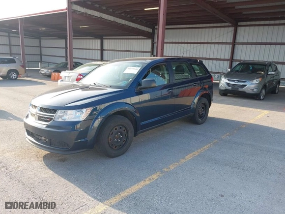 2014 Dodge Journey SE with VIN 3C4PDCAB5ET216618, listed as a IAAI auction lot 41973946 with 151,693 mi miles. Bid and sale history available at carsss.com. Image 2.