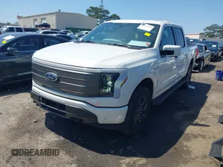 2022 Ford F-150 Lightning Pro z VIN 1FTVW1EL3NWG16227, wystawiony jako IAAI lot #41994584 z przebiegiem 23 341 mil mil oraz . Historia ofert i sprzedaży dostępna na DreamBid. Obrazek 19.