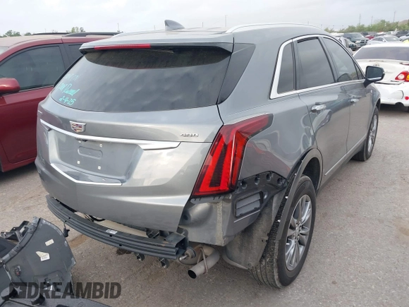 2021 Cadillac XT5 FWD Premium Luxury with VIN 1GYKNCRS5MZ128908, listed as a IAAI auction lot 41919571 with 51,280 mi miles and . Bid and sale history available at carsss.com. Image 4.