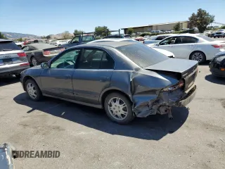 2002 Mitsubishi Galant ES z VIN 4A3AA46G02E097295, wystawiony jako Copart lot #67977274 z przebiegiem 149 375 mil mil oraz Szkody całkowita. Historia ofert i sprzedaży dostępna na DreamBid. Obrazek 2.