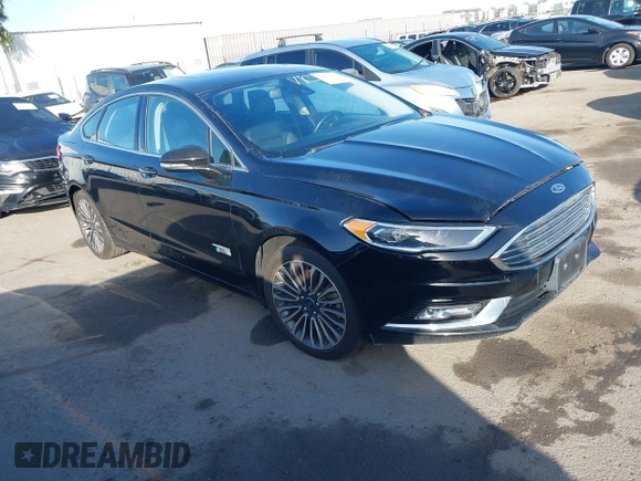 2017 Ford Fusion Energi SE with VIN 3FA6P0PU0HR129792, listed as a IAAI auction lot 41104376 with 86,659 mi miles. Bid and sale history available at carsss.com. Image 1.