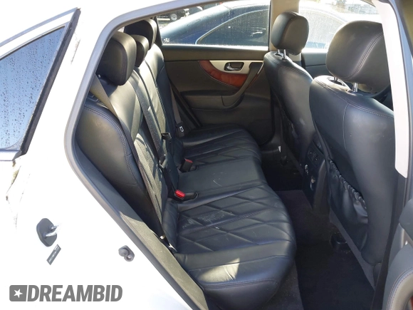 2014 Infiniti QX70 with VIN JN8CS1MW2EM411237, listed as a IAAI auction lot 42011806 with 148,133 mi miles and . Bid and sale history available at carsss.com. Image 8.