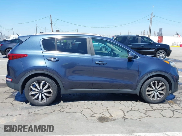 2017 Kia Sportage EX with VIN KNDPN3AC1H7227128, listed as a IAAI auction lot 42000430 with 108,878 mi miles and . Bid and sale history available at carsss.com. Image 6.