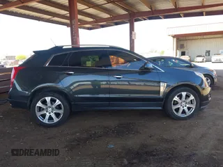 2014 Cadillac SRX Premium Collection z VIN 3GYFNDE31ES653114, wystawiony jako IAAI lot #42107858 z przebiegiem 125 192 mil mil oraz . Historia ofert i sprzedaży dostępna na DreamBid. Obrazek 13.