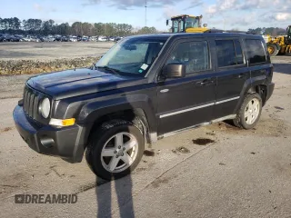 2010 Jeep Patriot Sport with VIN 1J4NF1GB7AD646626, listed as a Copart auction lot 87012374 with 130,867 mi miles and Salvage Title. Bid and sale history available at carsss.com. Image 1.