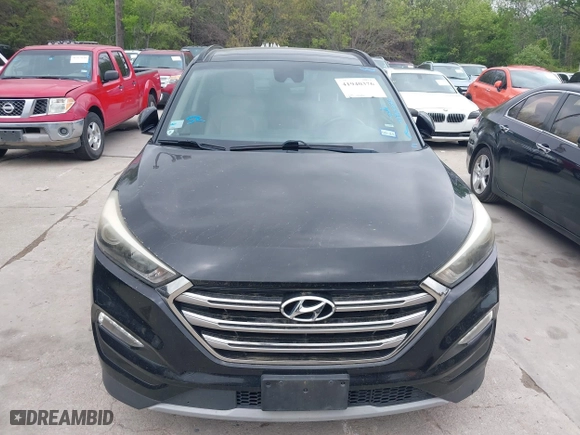 2017 Hyundai Tucson Value with VIN KM8J33A26HU362363, listed as a IAAI auction lot 41940376 with 127,986 mi miles. Bid and sale history available at carsss.com. Image 6.