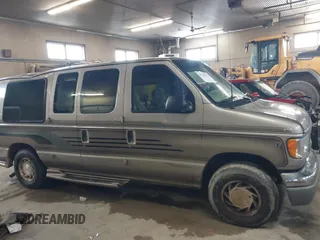 2002 Ford Econoline Cargo Recreational with VIN 1FDRE14L22HB53224, listed as a IAAI auction lot 41967017 with 202,065 mi miles. Bid and sale history available at carsss.com. Image 13.