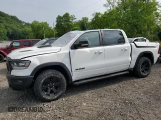 2022 Ram 1500 Rebel z VIN 1C6SRFLM7NN131895, wystawiony jako Copart lot #60100635 z przebiegiem 51 211 mil mil oraz Szkoda całkowita • Salvage title. Historia ofert i sprzedaży dostępna na DreamBid. Obrazek 1.