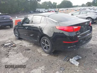 2014 Kia Optima LX z VIN 5XXGM4A72EG337457, wystawiony jako IAAI lot #42486150 z przebiegiem 135 338 mil mil oraz . Historia ofert i sprzedaży dostępna na DreamBid. Obrazek 3.