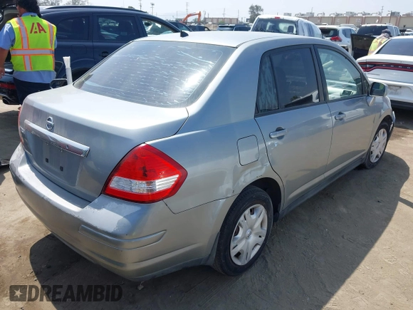 2011 Nissan Versa S with VIN 3N1BC1AP0BL393704, listed as a IAAI auction lot 42334003 with 164,394 mi miles and . Bid and sale history available at DreamBid. Image 4.