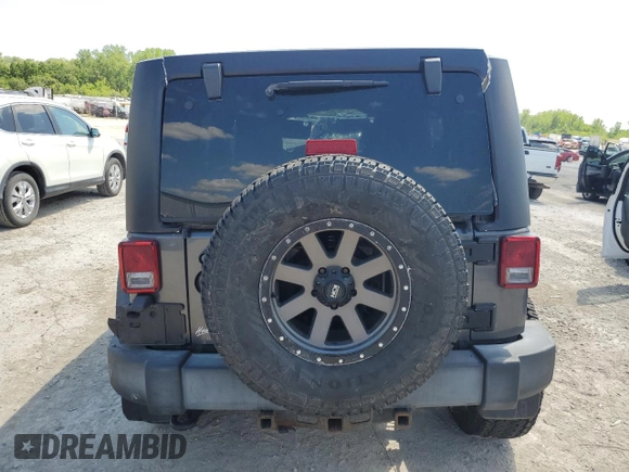 2017 Jeep Wrangler Unlimited Sport with VIN 1C4BJWDG5HL506501, listed as a Copart auction lot 55802395 with 96,756 mi miles and Salvage title. Bid and sale history available at DreamBid. Image 6.