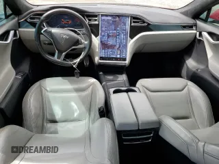 2016 Tesla Model S 90D with VIN 5YJSA1E42GF127593, listed as a Copart auction lot 52450495 with 144,151 mi miles and Salvage title. Bid and sale history available at DreamBid. Image 8.