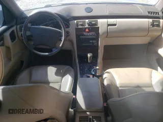 1997 Mercedes-Benz E-Class with VIN WDBJF72F0VA189407, listed as a Copart auction lot 76073234 with 114,692 mi miles and Salvage Title. Bid and sale history available at carsss.com. Image 8.