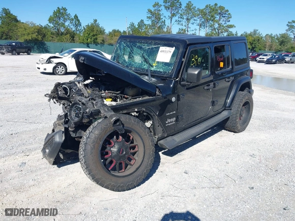 2019 Jeep Wrangler Unlimited Sahara with VIN 1C4HJXEG0KW604937, listed as a IAAI auction lot 40931379 with 94,821 mi miles. Bid and sale history available at carsss.com. Image 17.