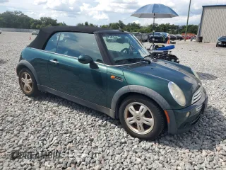 2007 MINI Convertible with VIN WMWRF335X7TG16568, listed as a Copart auction lot 66146885 with 97,502 mi miles and Clean title. Bid and sale history available at DreamBid. Image 4.