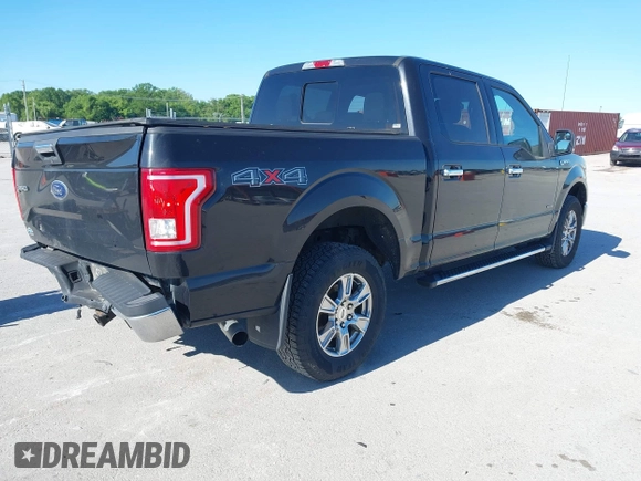 2015 Ford F-150 XLT with VIN 1FTEW1EPXFKD00531, listed as a IAAI auction lot 42321120 with 144,500 mi miles and . Bid and sale history available at DreamBid. Image 4.