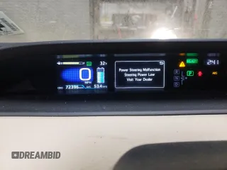 2019 Toyota Prius L Eco z VIN JTDKARFUXK3075083, wystawiony jako Copart lot #43968505 z przebiegiem 72 396 mil mil oraz Szkoda całkowita • Salvage title. Historia ofert i sprzedaży dostępna na DreamBid. Obrazek 9.