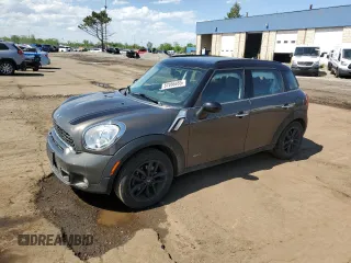 2012 MINI Countryman S z VIN WMWZC5C56CWM14210, wystawiony jako Copart lot #57466485 z przebiegiem 114 029 mil mil oraz Czysty tytuł • Clean title. Historia ofert i sprzedaży dostępna na DreamBid. Obrazek 1.