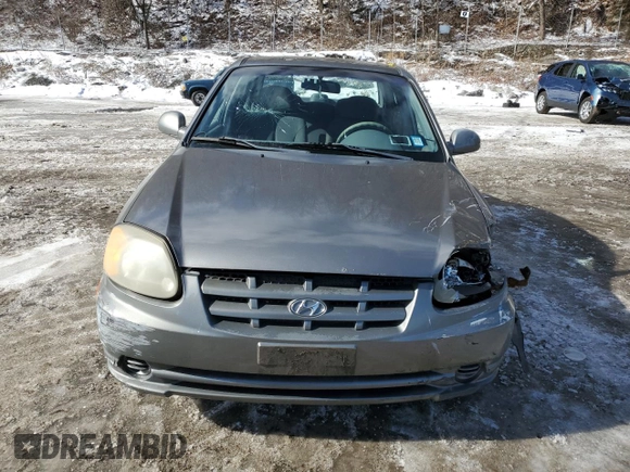 2003 Hyundai Accent GL with VIN KMHCG45C33U469496, listed as a Copart auction lot 45926595 with 77,737 mi miles and Salvage Title. Bid and sale history available at carsss.com. Image 5.
