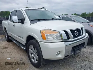 2013 Nissan Titan PRO-4X with VIN 1N6AA0EC7DN312844, listed as a IAAI auction lot 42034411 with Not Provided miles. Bid and sale history available at carsss.com. Image 1.