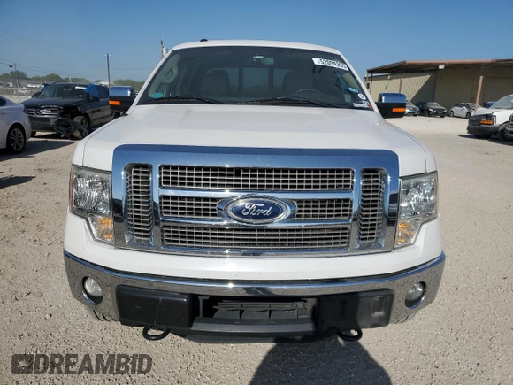 2011 Ford F-150 XLT with VIN 1FTFW1ET7BFD38965, listed as a Copart auction lot 52094205 with 0 mi miles and Salvage Title. Bid and sale history available at carsss.com. Image 5.