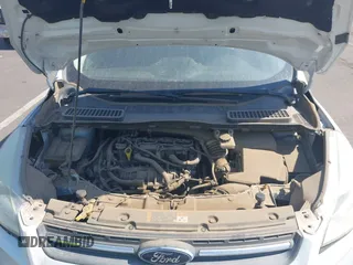 2016 Ford Escape SE z VIN 1FMCU0GXXGUC13444, wystawiony jako IAAI lot #39566364 z przebiegiem 162 059 mil mil oraz . Historia ofert i sprzedaży dostępna na DreamBid. Obrazek 10.