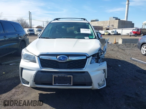2014 Subaru Forester XT Touring with VIN JF2SJGMC4EH534647, listed as a IAAI auction lot 41828950 with 106,375 mi miles and . Bid and sale history available at DreamBid. Image 12.