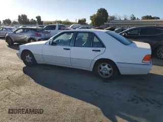 1995 Mercedes-Benz S 320 with VIN WDBGA32E8SA252144, listed as a Copart auction lot 77053484 with 126,534 mi miles and Clean Title. Bid and sale history available at DreamBid. Image 2.
