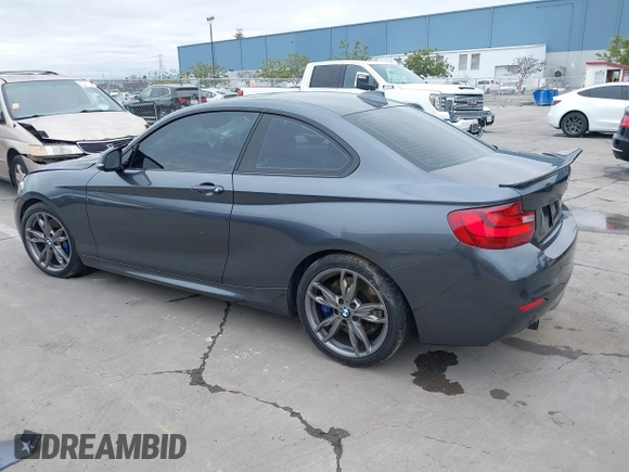 2015 BMW 2 Series M235i with VIN WBA1J7C50FV358774, listed as a IAAI auction lot 41559637 with 82,344 mi miles and . Bid and sale history available at carsss.com. Image 3.