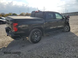 2024 Chevrolet Colorado 4WD Z71 with VIN 1GCPTDEK0R1112392, listed as a Copart auction lot 77392414 with 5,557 mi miles and Salvage Title. Bid and sale history available at carsss.com. Image 3.