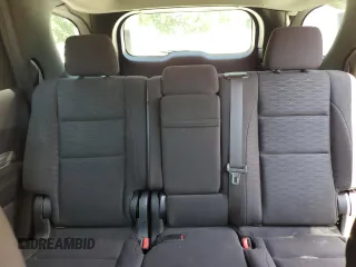 2018 Dodge Durango SXT with VIN 1C4RDJAG4JC161335, listed as a Copart auction lot 57243095 with 74,690 mi miles and Salvage title. Bid and sale history available at DreamBid. Image 10.