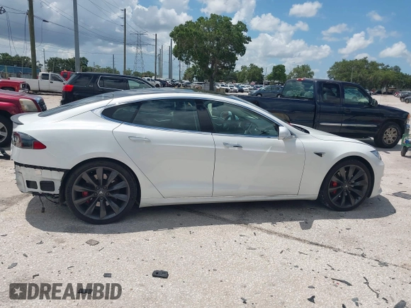 2017 Tesla Model S 100D with VIN 5YJSA1E45HF189006, listed as a IAAI auction lot 42540693 with 64,827 mi miles and . Bid and sale history available at DreamBid. Image 14.