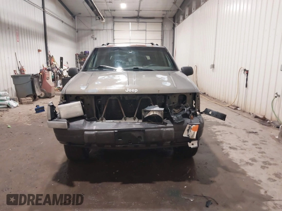 1996 Jeep Grand Cherokee Laredo with VIN 1J4GZ58S5TC182766, listed as a IAAI auction lot 41372356 with 234,390 mi miles. Bid and sale history available at carsss.com. Image 13.