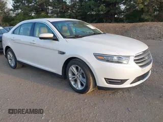 2015 Ford Taurus SEL with VIN 1FAHP2E82FG202143, listed as a IAAI auction lot 42053737 with 113,839 mi miles and . Bid and sale history available at carsss.com. Image 1.