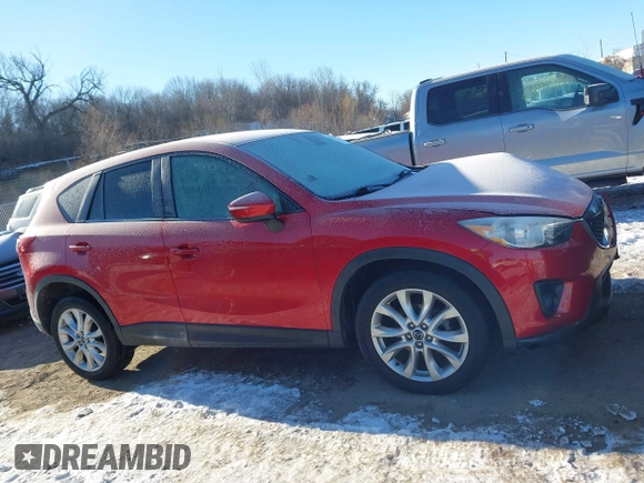 2015 Mazda CX-5 Grand Touring with VIN JM3KE4DY0F0538246, listed as a IAAI auction lot 41629662 with 87,788 mi miles. Bid and sale history available at carsss.com. Image 14.