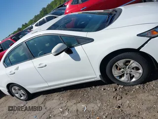 2014 Honda Civic LX z VIN 19XFB2F50EE049880, wystawiony jako IAAI lot #42042404 z przebiegiem 98 304 mil mil oraz . Historia ofert i sprzedaży dostępna na DreamBid. Obrazek 13.