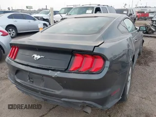2018 Ford Mustang EcoBoost with VIN 1FA6P8TH3J5146392, listed as a IAAI auction lot 41780815 with 70,992 mi miles and . Bid and sale history available at carsss.com. Image 4.