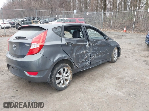 2013 Hyundai Accent SE with VIN KMHCU5AE1DU091931, listed as a IAAI auction lot 41783034 with 72,732 mi miles. Bid and sale history available at carsss.com. Image 4.