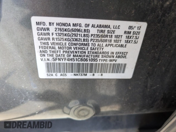 2012 Honda Pilot EX-L z VIN 5FNYF4H51CB061095, wystawiony jako Copart lot #57149985 z przebiegiem 170 486 mil mil oraz Szkoda całkowita • Salvage title. Historia ofert i sprzedaży dostępna na DreamBid. Obrazek 14.