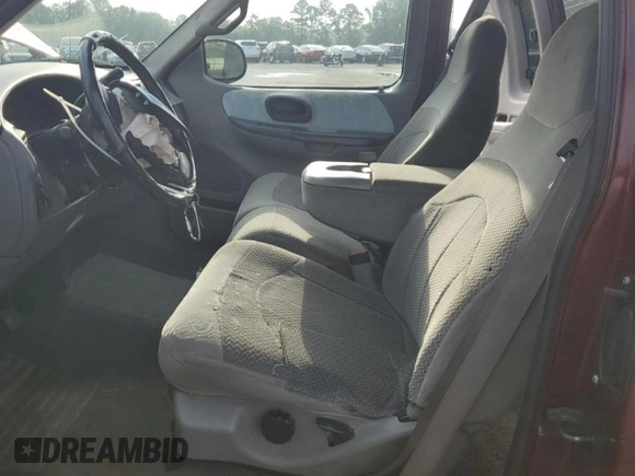 1999 Ford F-150 XL with VIN 1FTRX17LXXNA05552, listed as a Copart auction lot 60047025 with 193,122 mi miles and Salvage title. Bid and sale history available at DreamBid. Image 7.