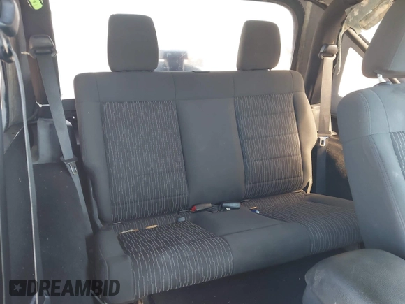 2012 Jeep Wrangler Arctic with VIN 1C4AJWBG7CL170079, listed as a IAAI auction lot 41004260 with 83,408 mi miles and . Bid and sale history available at DreamBid. Image 8.