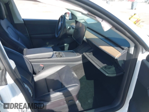 2022 Tesla Model Y Long Range with VIN 7SAYGDEE0NF340822, listed as a IAAI auction lot 41881224 with Not Provided miles and . Bid and sale history available at DreamBid. Image 5.
