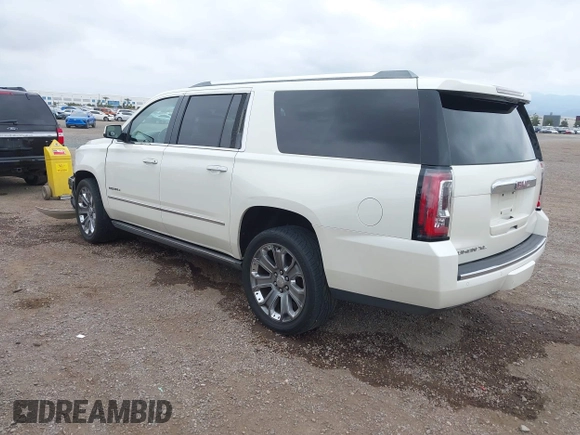 2015 GMC Yukon XL Denali with VIN 1GKS2JKJ7FR641430, listed as a IAAI auction lot 42163969 with 129,085 mi miles. Bid and sale history available at carsss.com. Image 3.