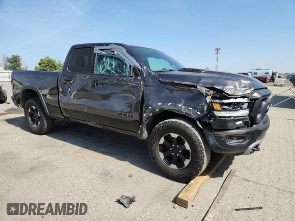 2019 Ram 1500 Rebel z VIN 1C6SRFET7KN875819, wystawiony jako Copart lot #57805775 z przebiegiem 80 521 mil mil oraz Szkoda całkowita • Salvage title. Historia ofert i sprzedaży dostępna na DreamBid. Obrazek 4.