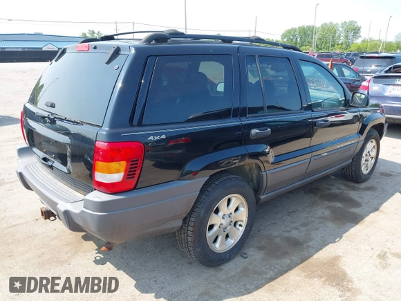2001 Jeep Grand Cherokee Laredo with VIN 1J4GW48S31C558946, listed as a IAAI auction lot 42384392 with 252,393 mi miles and . Bid and sale history available at DreamBid. Image 4.