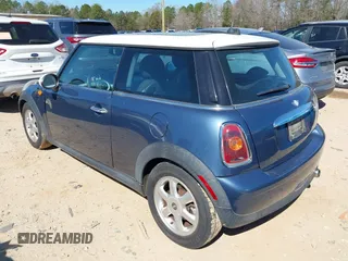 2009 MINI Cooper Hardtop with VIN WMWMF33549TW79871, listed as a IAAI auction lot 41844591 with 236,255 mi miles. Bid and sale history available at carsss.com. Image 3.
