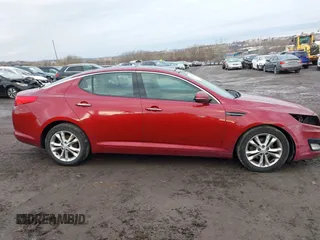 2013 Kia Optima EX z VIN 5XXGN4A78DG141924, wystawiony jako IAAI lot #41474952 z przebiegiem 172 814 mil mil oraz . Historia ofert i sprzedaży dostępna na DreamBid. Obrazek 12.
