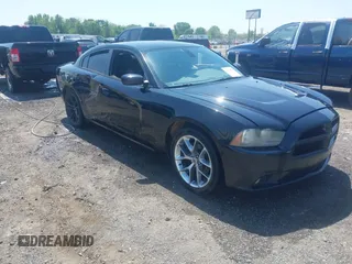 2013 Dodge Charger SXT z VIN 2C3CDXHG0DH613611, wystawiony jako IAAI lot #42026894 z przebiegiem 244 603 mil mil oraz . Historia ofert i sprzedaży dostępna na DreamBid. Obrazek 1.
