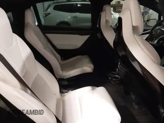 2016 Tesla Model X 70D with VIN 5YJXCBE27GF004974, listed as a IAAI auction lot 41630556 with 167,709 mi miles. Bid and sale history available at carsss.com. Image 8.